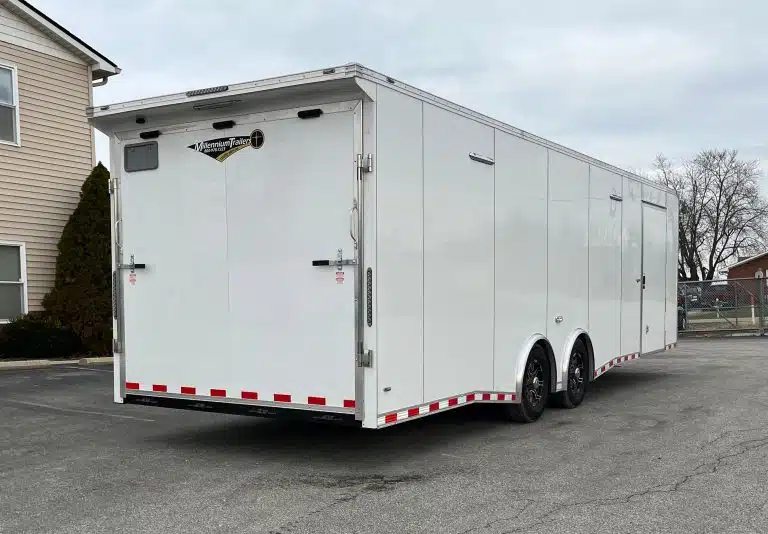 Enclosed Car Hauler 2026 28ft. Extreme w/6K Torsion Spread Axles, Finished Interior w/Cabinets & Alum. Wheels 0592 - side view